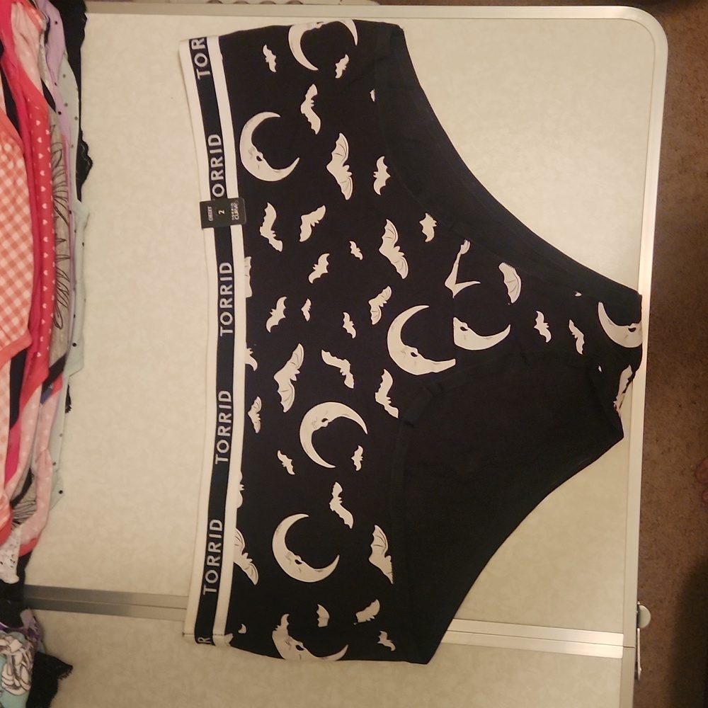 Torrid bat and moon